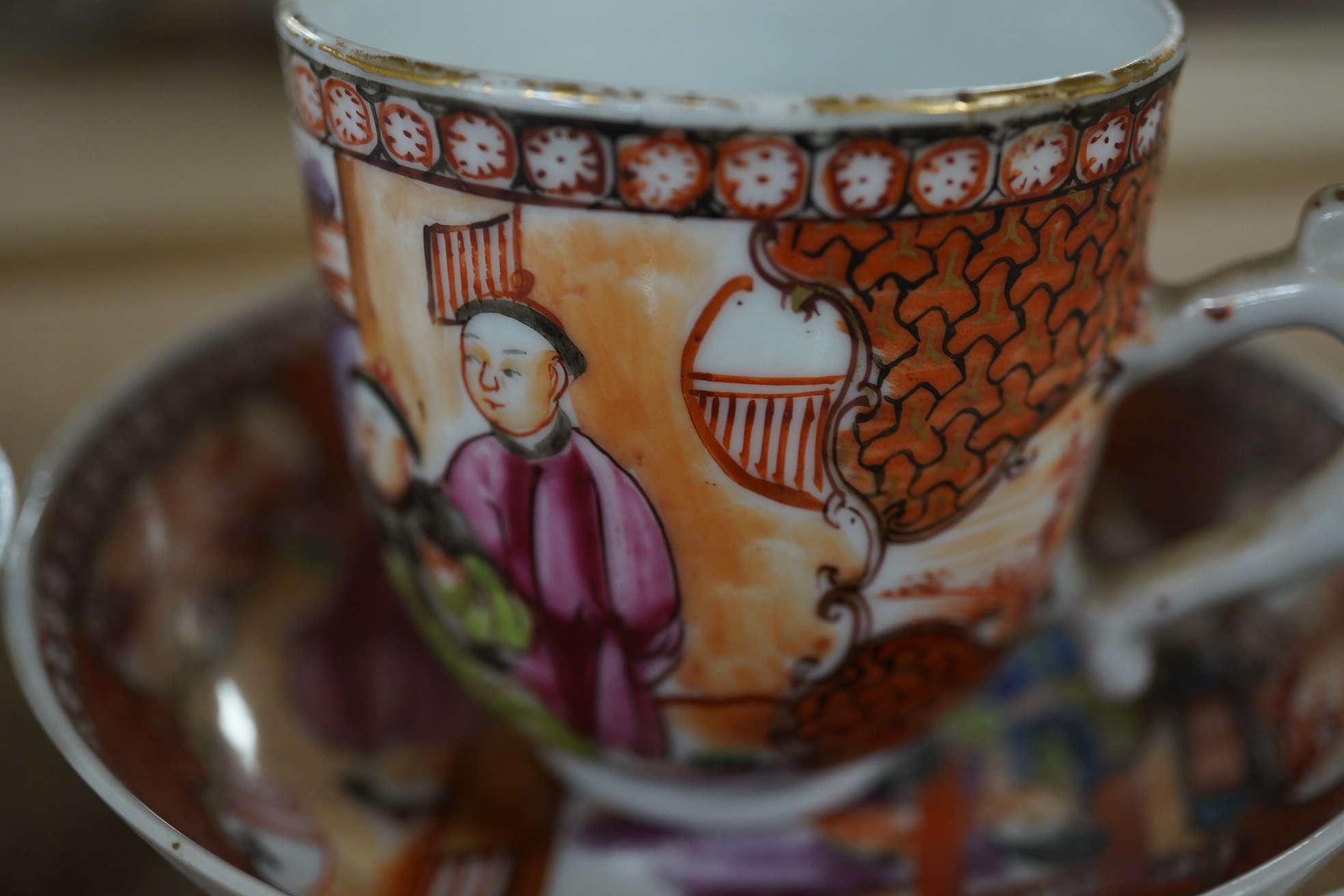 A Chinese porcelain famille rose 'double pheasant' tea bowl and saucer and a Mandarin pattern coffee cup and saucer, all Qianlong period, largest 11.5cm diameter. Condition - one saucer broken, others fair to good